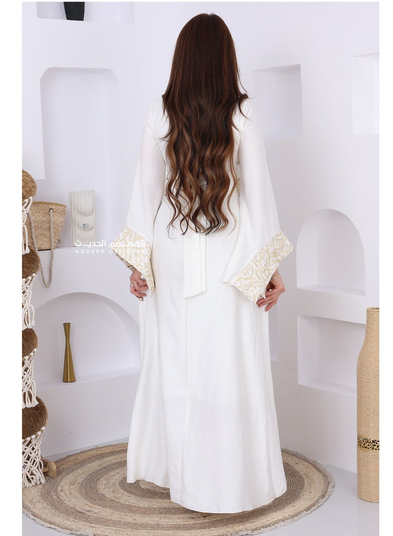 Modern Design A women's jalabiya made of Bahraini crepe with wide sleeves that add an attractive touch and elegant golden detailing that enhances its elegance. - Image 3
