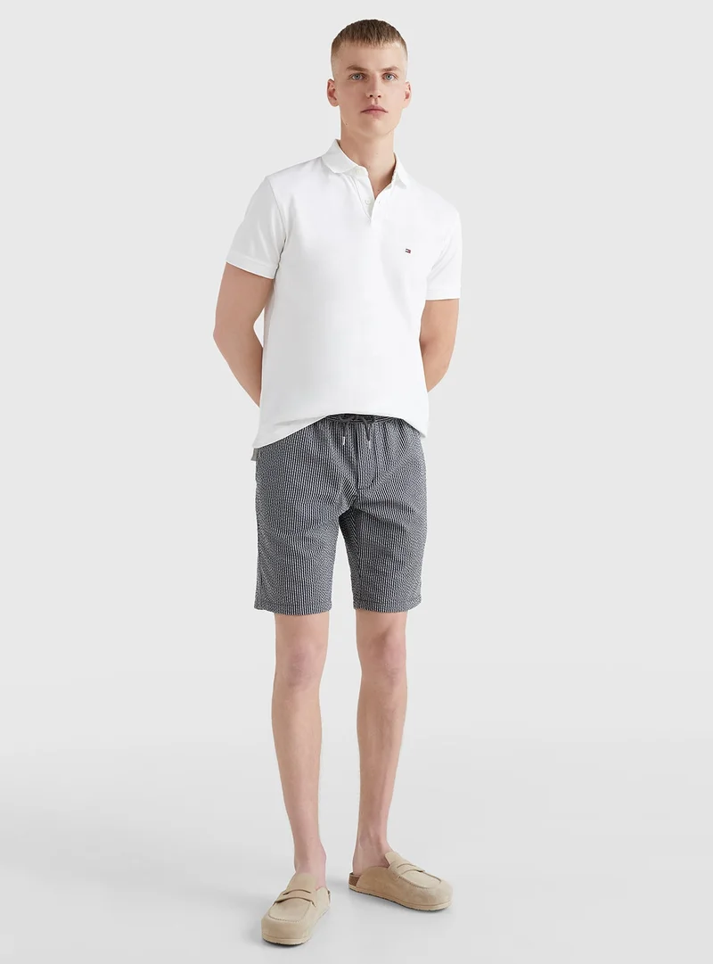 TOMMY HILFIGER white 1985 Regular Fit Pique Polo Shirt for Men | Best Price UAE