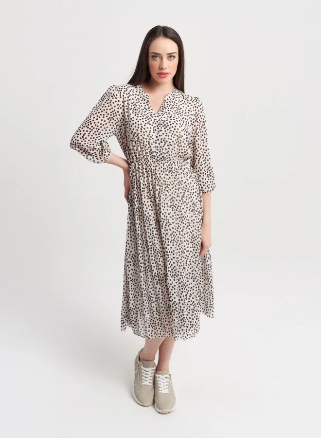 ZABAIONE Elegant Polka Dot Midi Dress with Flowy Silhouette, Perfect for Casual and Semi-Formal Occasions