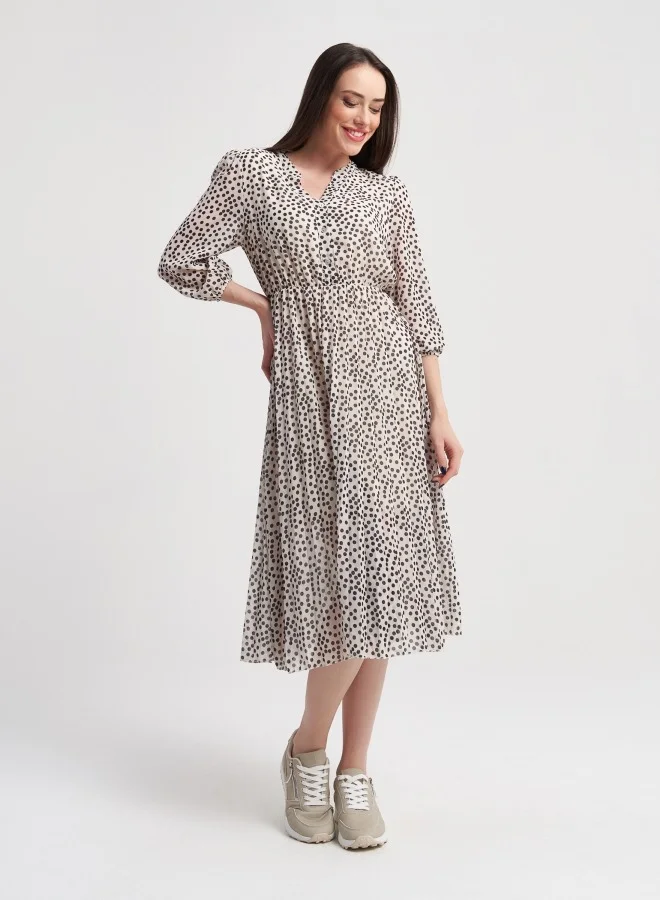 ZABAIONE Elegant Polka Dot Midi Dress with Flowy Silhouette, Perfect for Casual and Semi-Formal Occasions