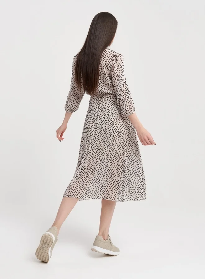 ZABAIONE Elegant Polka Dot Midi Dress with Flowy Silhouette, Perfect for Casual and Semi-Formal Occasions