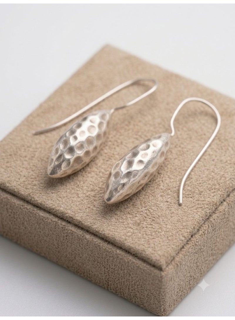 The Intermix Gems Hammered Teardrop Dangle Earrings in 925 Sterling Silver - Image 1