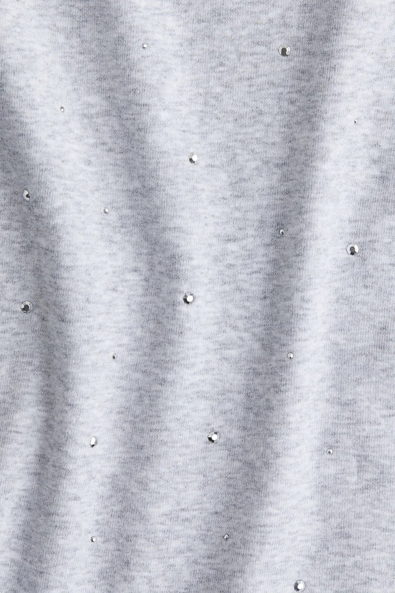 اتش اند ام بلوزة بأكمام طويلة من جيرسيه قطني