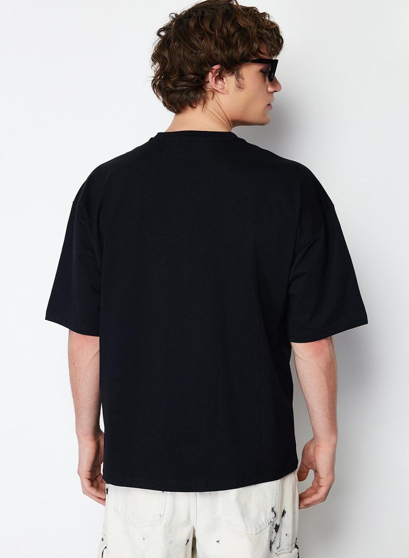 trendyol Black Oversize Cotton T-Shirt with Embroidery Detail - TMNSS21TS3685 - Image 3