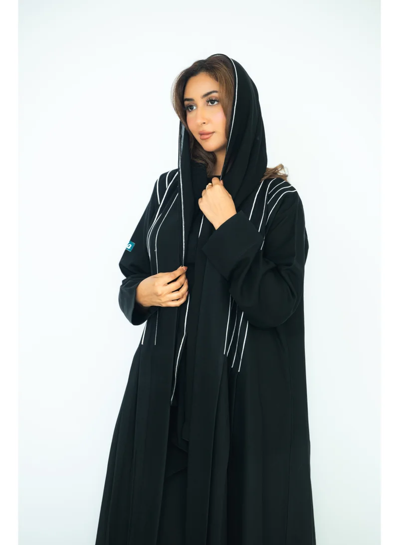 via abaya Black linen abaya with white embroidery