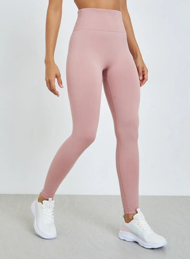 Styli Active Coral Seamless Back Scrunch Leggings