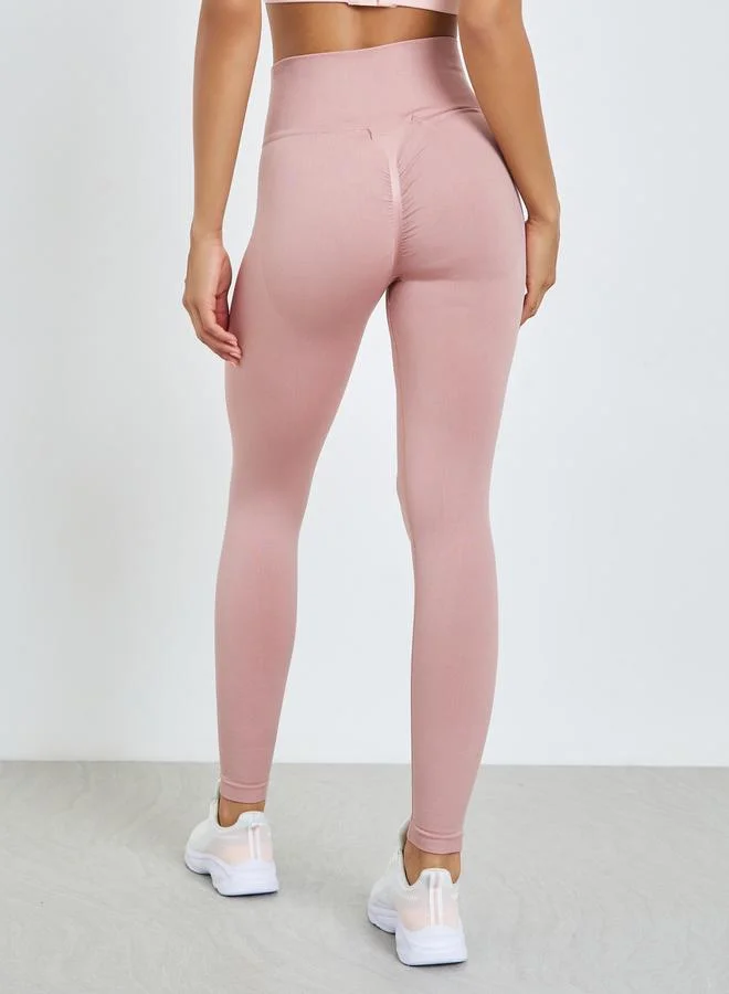 Styli Active  Coral Seamless Back Scrunch Leggings for Women | Best Price UAE