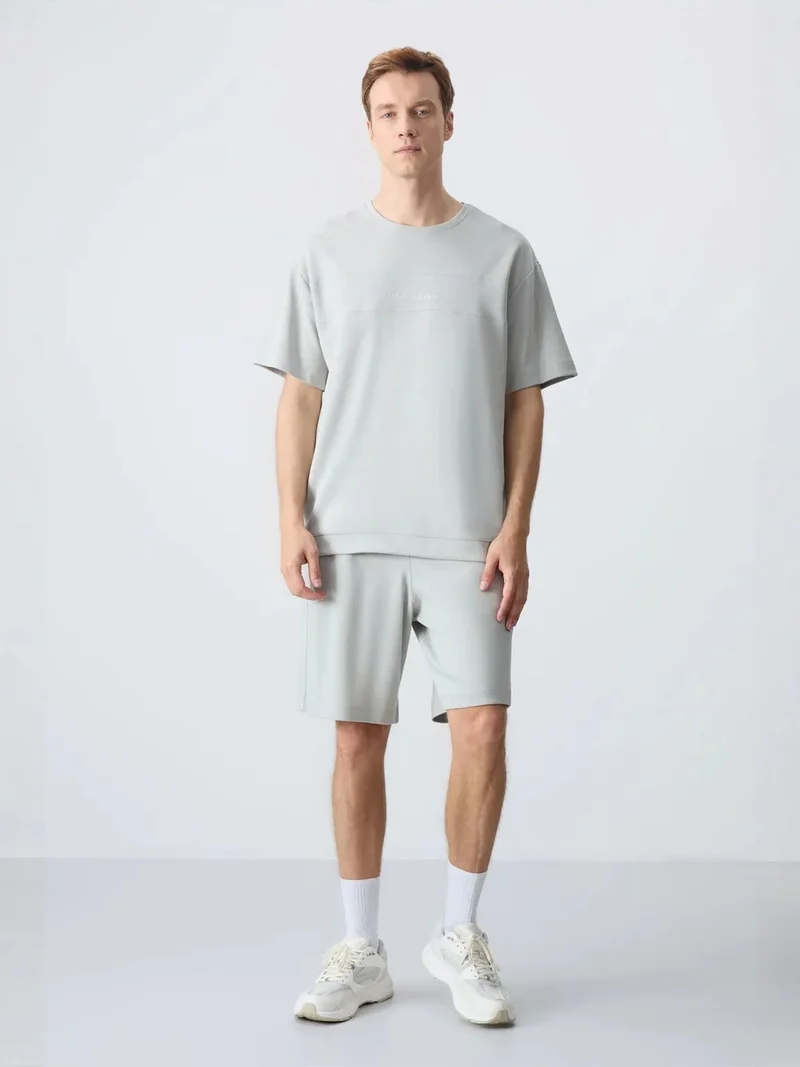 تومي لايف TOMMY Men's Oversized Cotton-Blend T-Shirt And Shorts Set