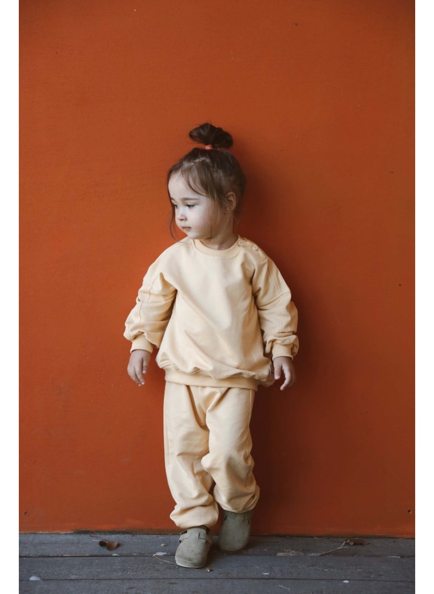 Pastel Yellow Back Printed Seasonal Tracksuit Set - pzsku/ZD5AB6344D0ACCD74D970Z/45/_/1730722647/334137ab-0d7f-4c45-b893-212dca762514