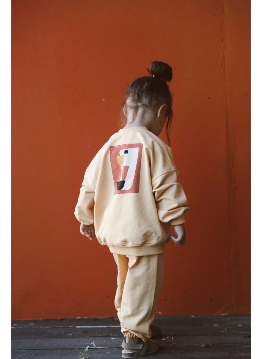 Pastel Yellow Back Printed Seasonal Tracksuit Set - pzsku/ZD5AB6344D0ACCD74D970Z/45/_/1730722699/07a14fce-debf-4d88-94a6-0277ea804efe