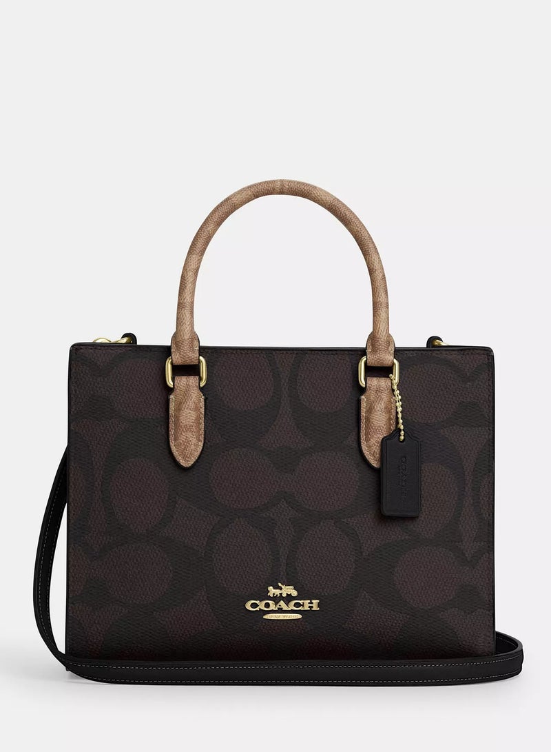 coachoutlet حقيبة توت صغيرة ماغي من كوتش في جلد مميز، حقيبة كتف نسائية، حقيبة عبر الجسم نسائية، حقيبة يد نسائية، حقيبة سفر نسائية، جوز الهند-أسود-25 سم - Image 1