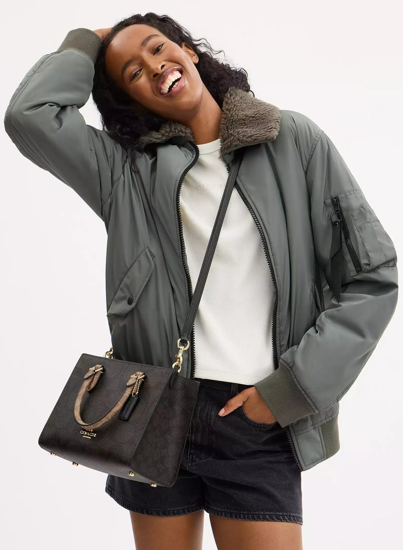 coachoutlet حقيبة توت صغيرة ماغي من كوتش في جلد مميز، حقيبة كتف نسائية، حقيبة عبر الجسم نسائية، حقيبة يد نسائية، حقيبة سفر نسائية، جوز الهند-أسود-25 سم - Image 3