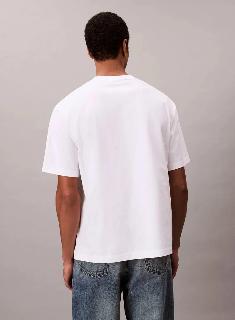 Calvin Klein Jeans Brilliant White Calvin Klein Logo Relaxed Tee for Men | Best Price UAE