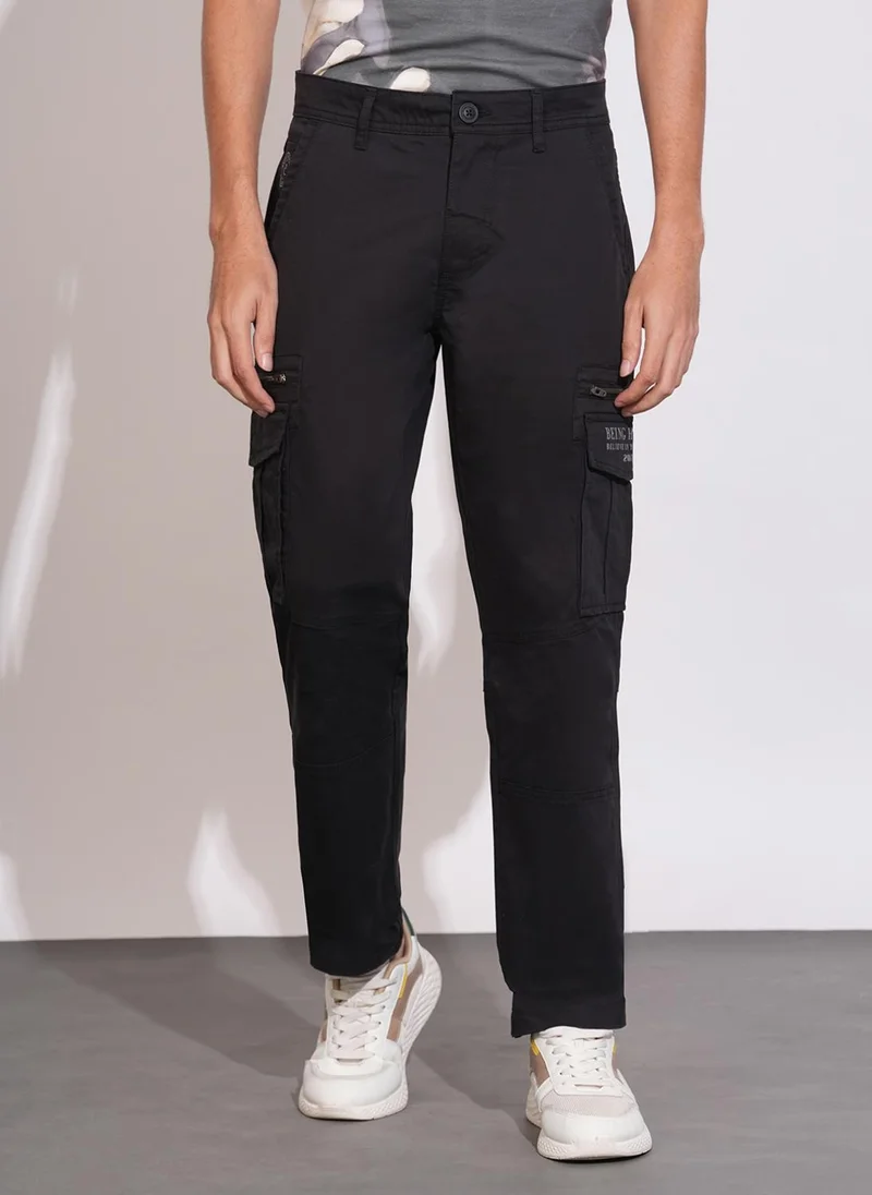 بيينغ هيومان Men Black Solid Regular Fit Cargo Pants
