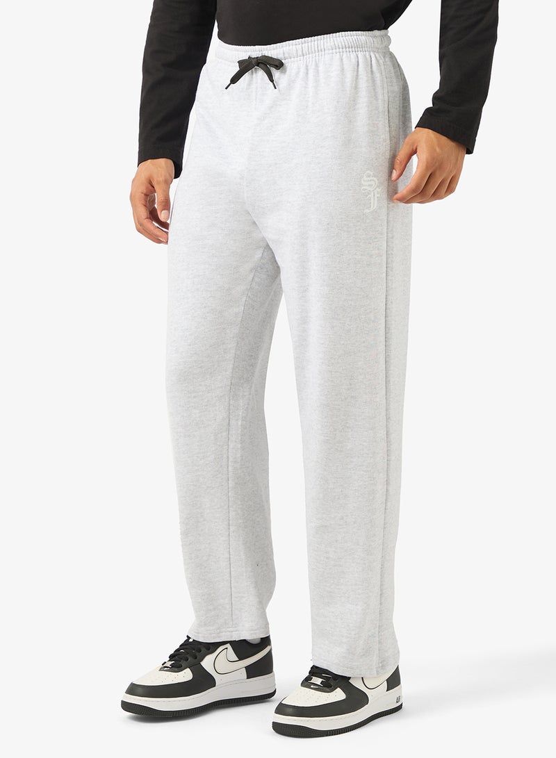 سفنتي فايف بيسيكس بنطلون رياضي فضفاض بتصميم نصي - Image 1
