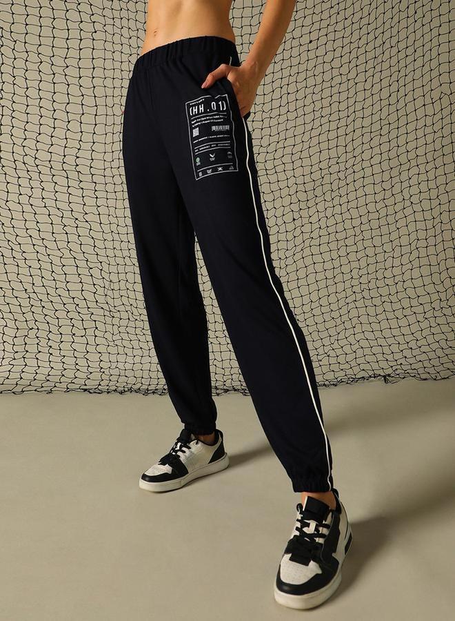 Hubberholme Graphic Print Pants with Contrast Detail - Image 2