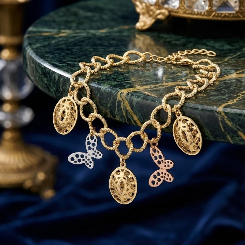An elegant gold bracelet, with circular rings decorated with hollow oval gold pendants, and butterflies in silver and rose gold, with an adjustable clasp to suit you. - Image 4