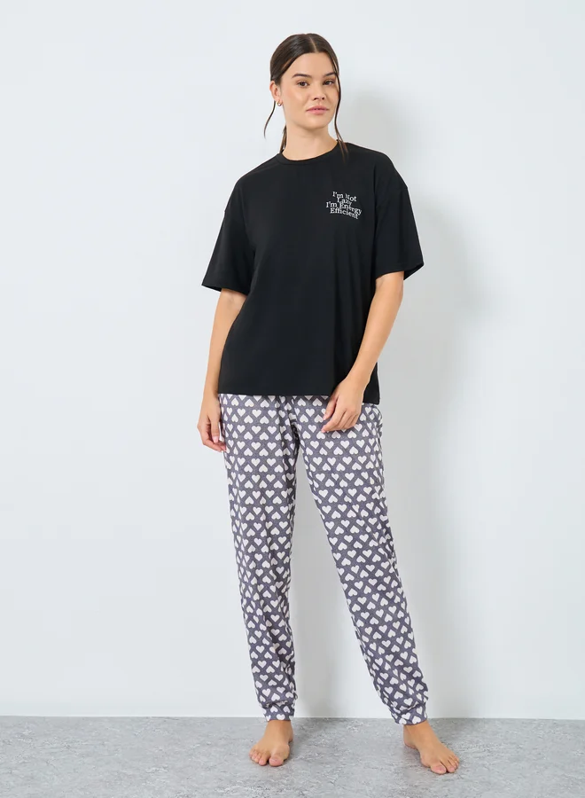 Styli Styli Drop Shoulder Slogan T-Shirt and Heart Cuffed Pyjama Set