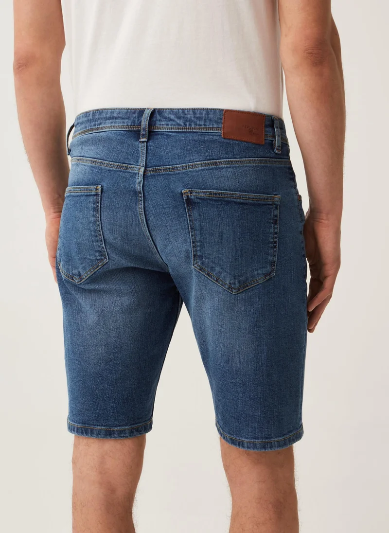 او في اس Regular-fit stretch denim Bermuda shorts