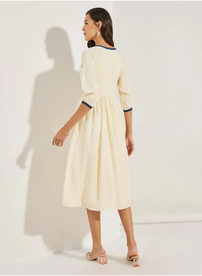 ستايلي Embroidered Panel Tie Tassel Midi Dress