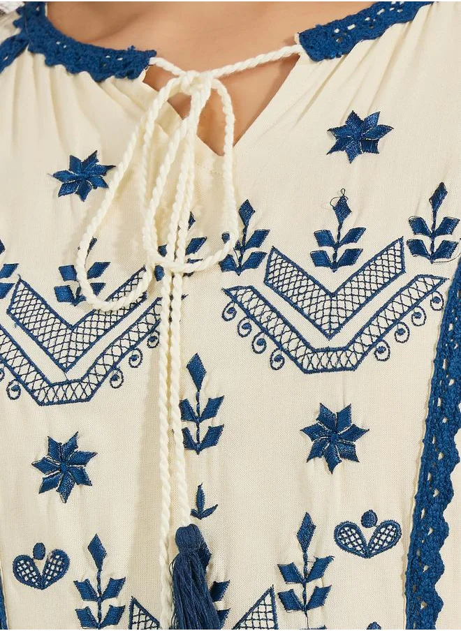 ستايلي Embroidered Panel Tie Tassel Midi Dress