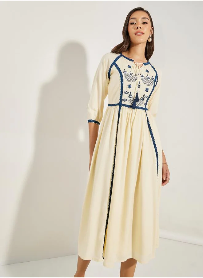 ستايلي Embroidered Panel Tie Tassel Midi Dress