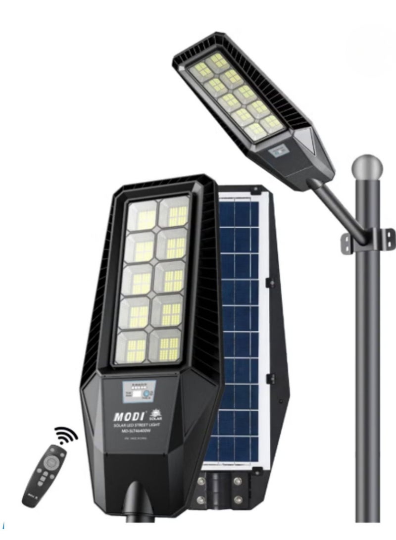 مودي مصباح شارع LED يعمل بالطاقة الشمسية، بقوة 300 واط | مستشعر حركة، جهاز تحكم عن بُعد، مصباح خارجي مقاوم للماء، مناسب لإضاءة الحدائق والشوارع والساحات - أبيض ساطع ٦٥٠٠ كلفن - Image 1