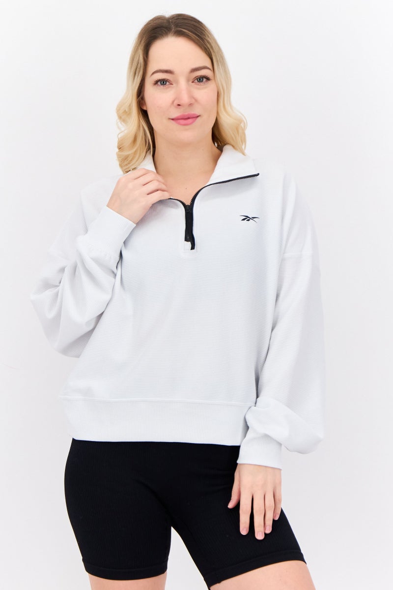 Reebok ملابس رياضية نسائية بأكمام طويلة مناسبة للطبقة المتوسطة في الهواء الطلق، أبيض فاتح - Image 1