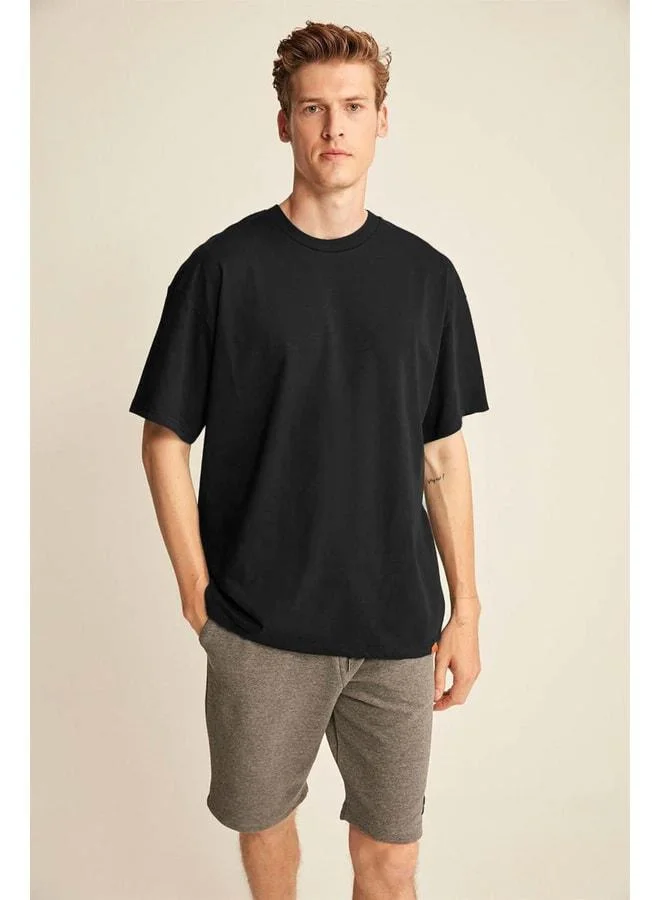 Grimelange Jett Men's Oversize Fit %100 Organic Cotton Thick-Texture Crew Neck Black T‑shirt.
