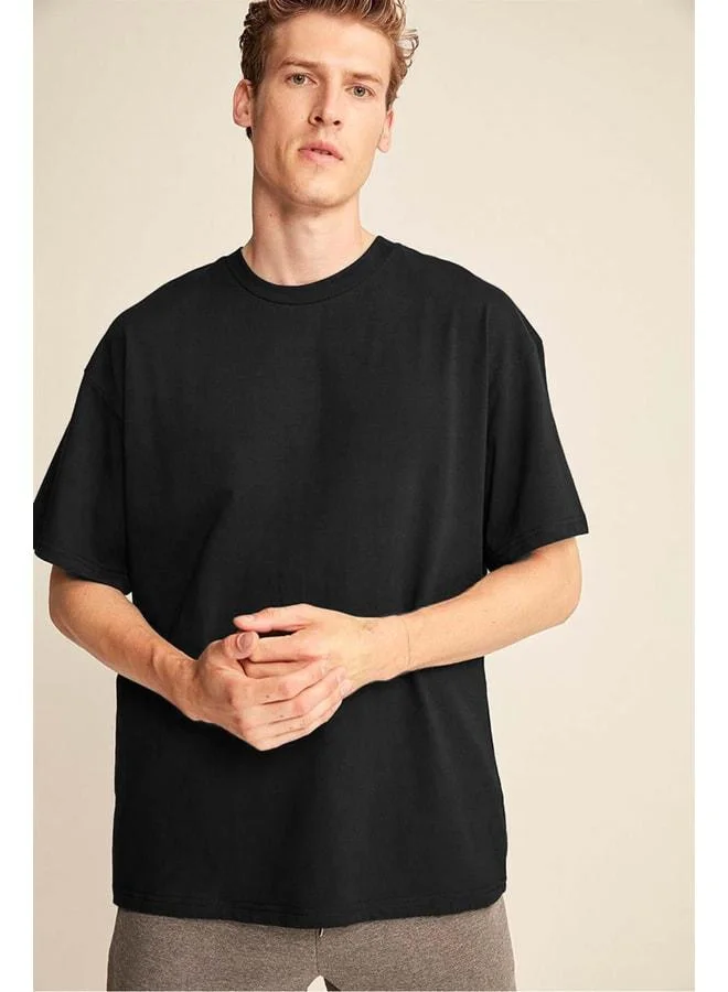 Grimelange Jett Men's Oversize Fit %100 Organic Cotton Thick-Texture Crew Neck Black T‑shirt.