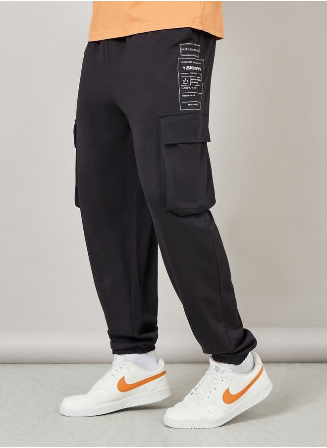 Graphic Print Oversized Cargo Joggers - pzsku/ZD5EE11E51F6E75D8F25DZ/45/_/1710080132/93de4ae7-f193-42cc-a8ff-e276f51c2906