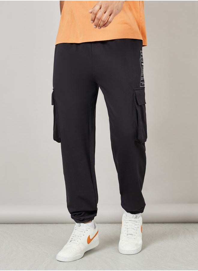 Graphic Print Oversized Cargo Joggers - pzsku/ZD5EE11E51F6E75D8F25DZ/45/_/1710080134/f7e8d782-d6dc-49da-8e6a-775ce0eba98a