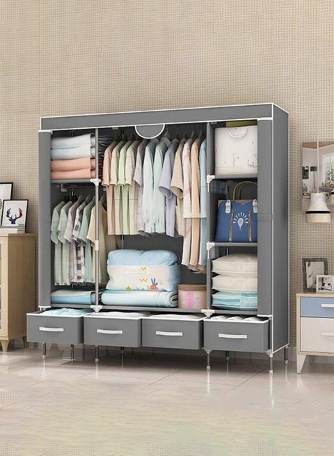 Foldable fabric wardrobe and luggage organizer with hanging rods, 4 storage drawers and a clothes rack for storing bags, toys and shoes