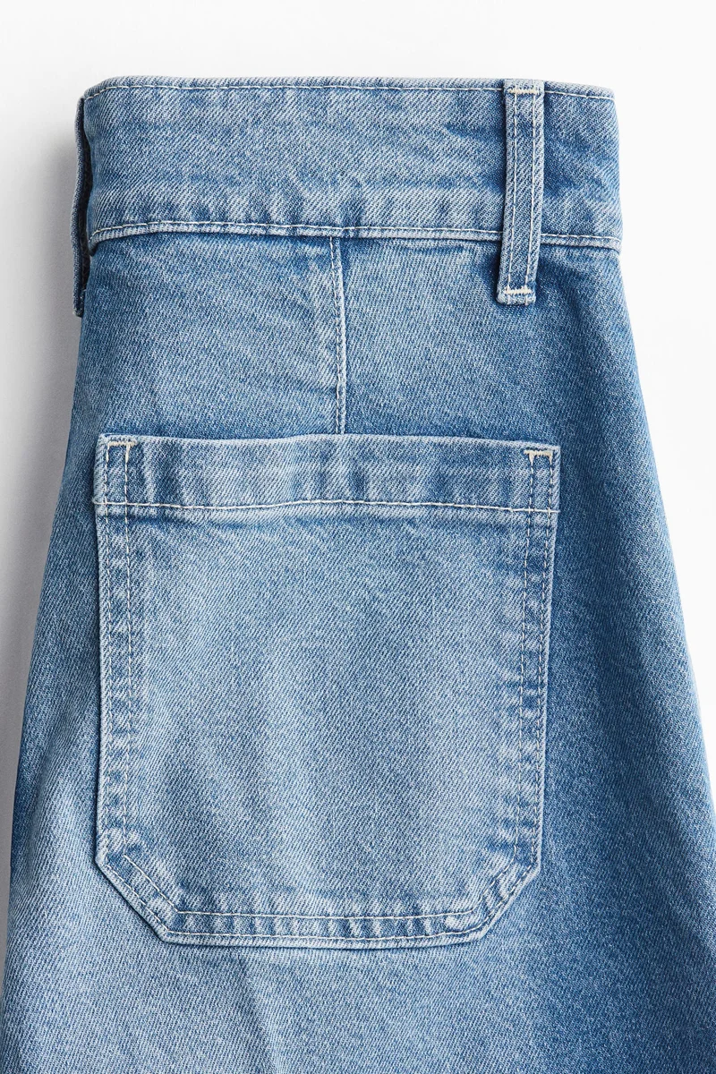 اتش اند ام جينز بساق واسعة وخصر عالي