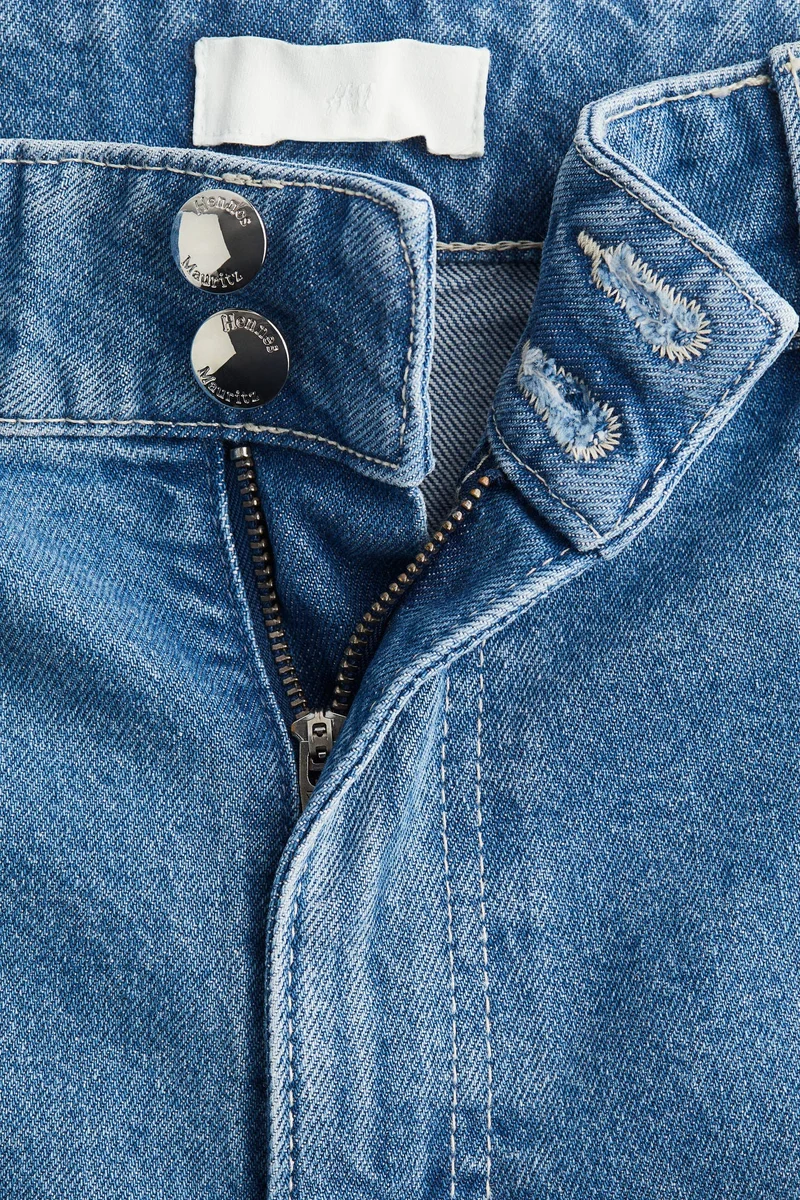 اتش اند ام جينز بساق واسعة وخصر عالي