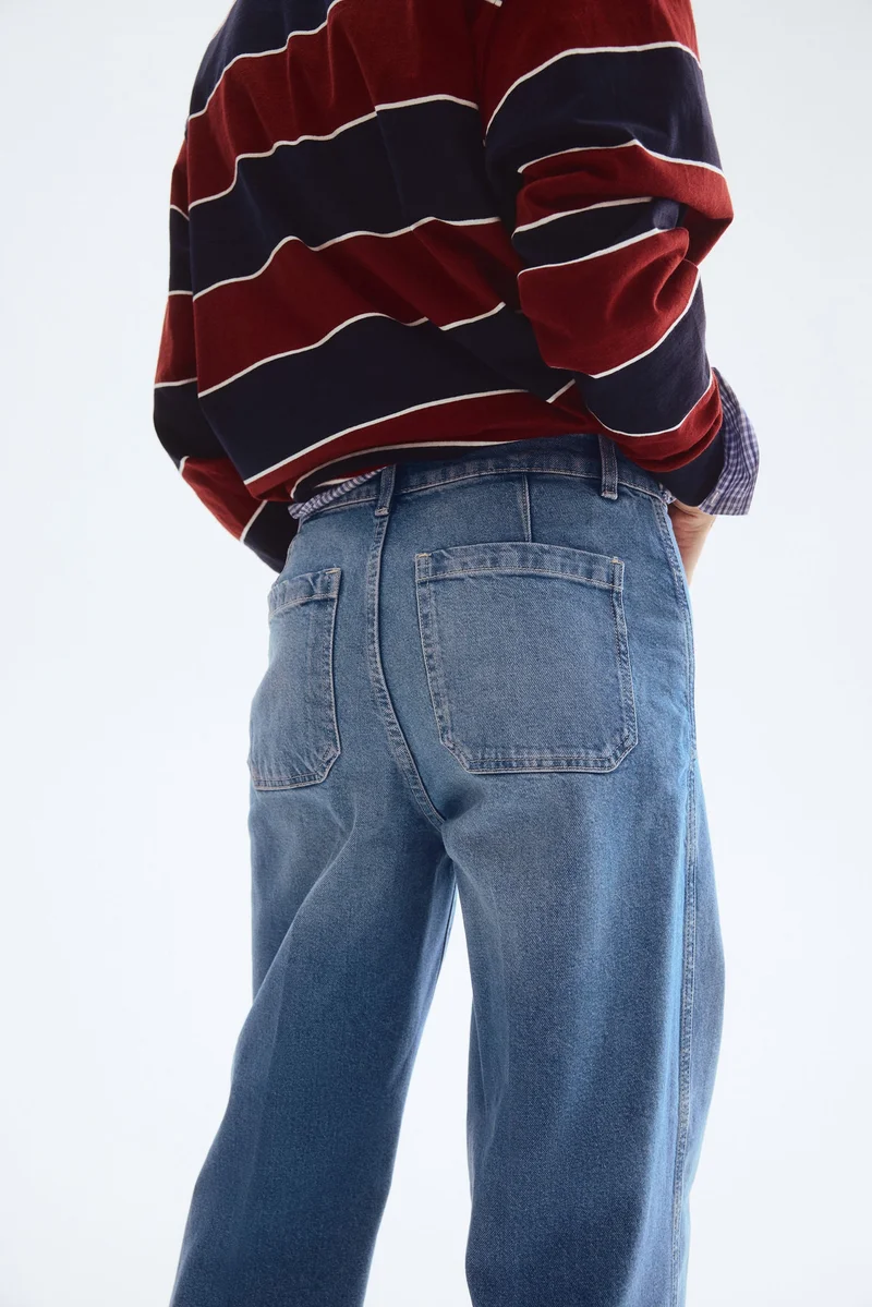 اتش اند ام جينز بساق واسعة وخصر عالي