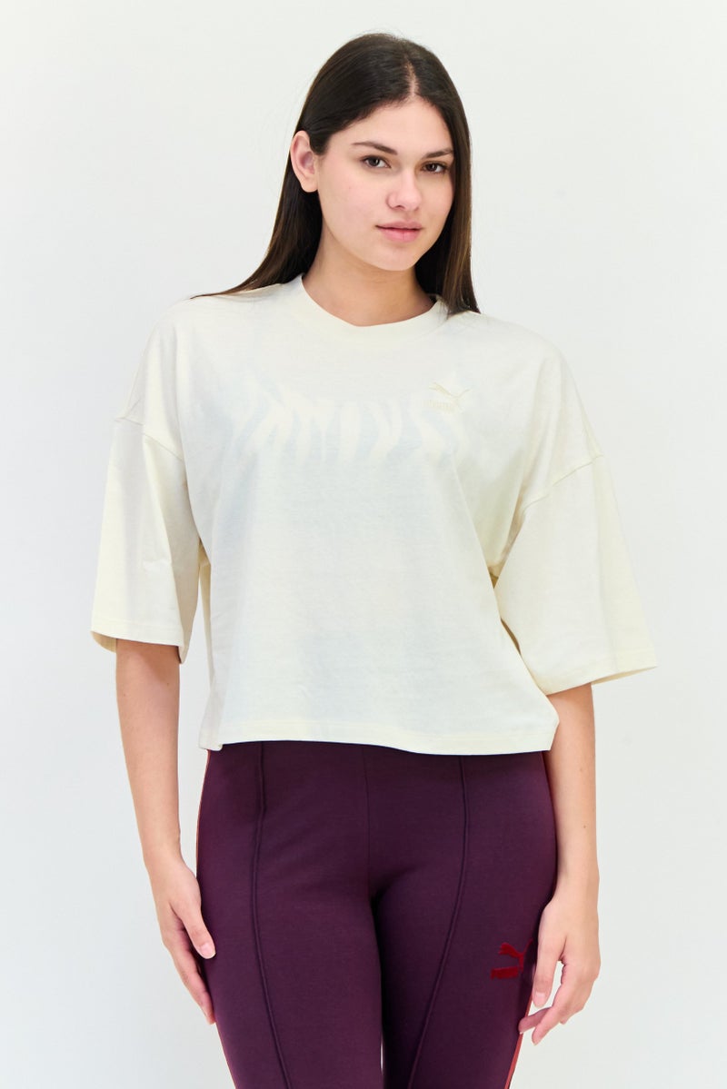 PUMA Women Sportswear Fit Short Sleeve Outdoor T-Shirt, Beige - Image 1