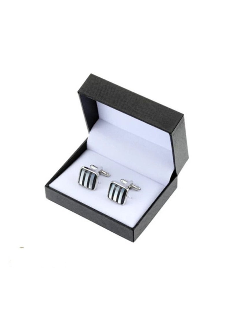 An elegant pearl shell cufflinks set