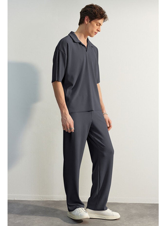 trendyol Limited Edition Dark Grey Oversize/Wide Fit Textured Anti-Wrinkle Polo Neck T-Shirt TMNSS23PO00020 - Image 4