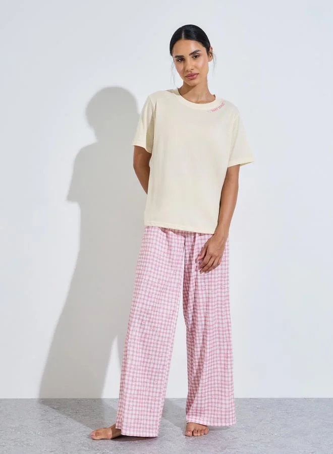 Styli Multi-Color Slogan Print T-Shirt And Checked Pants Pyjama Set