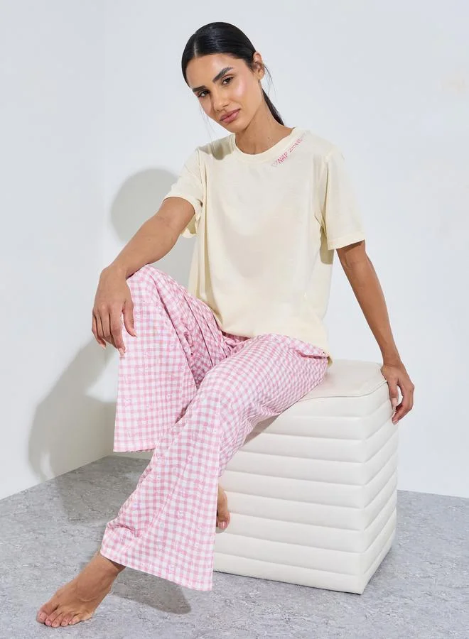 Styli Multi-Color Slogan Print T-Shirt And Checked Pants Pyjama Set