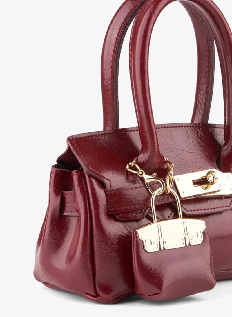 Women's Box Maroon Charm Gift Design Twist-Lock Hand, Arm, and Shoulder Bag.
