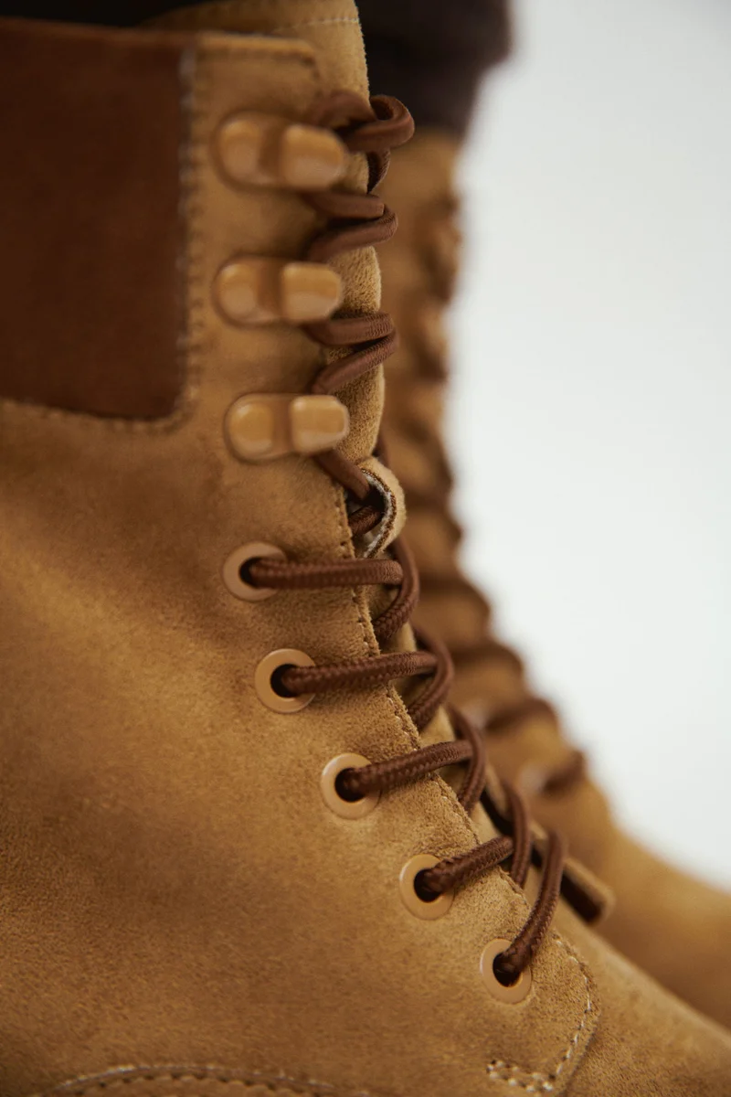 اتش اند ام بوت بأربطة للإغلاق