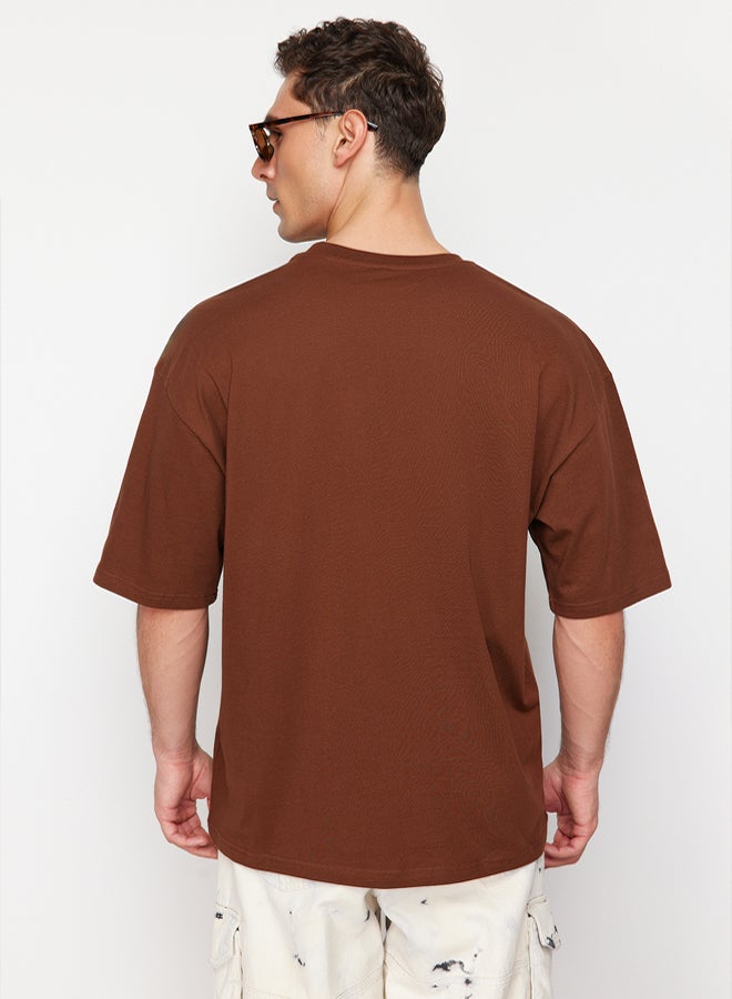 trendyol Brown Oversize/Wide Cutting Dinosaur Embroidered 100% Cotton T-Shirt TMNSS23TS00243 - Image 2