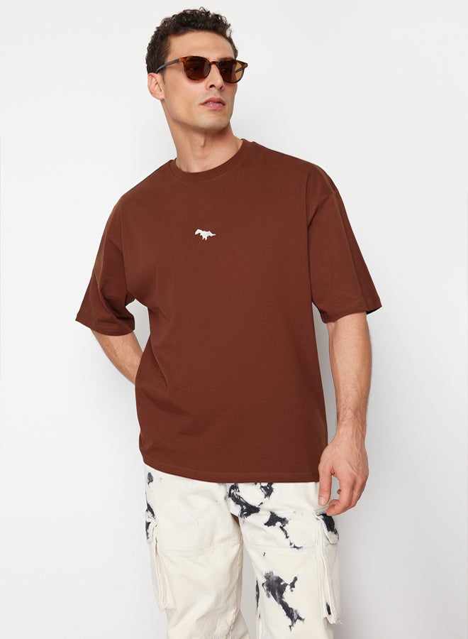 trendyol Brown Oversize/Wide Cutting Dinosaur Embroidered 100% Cotton T-Shirt TMNSS23TS00243 - Image 1