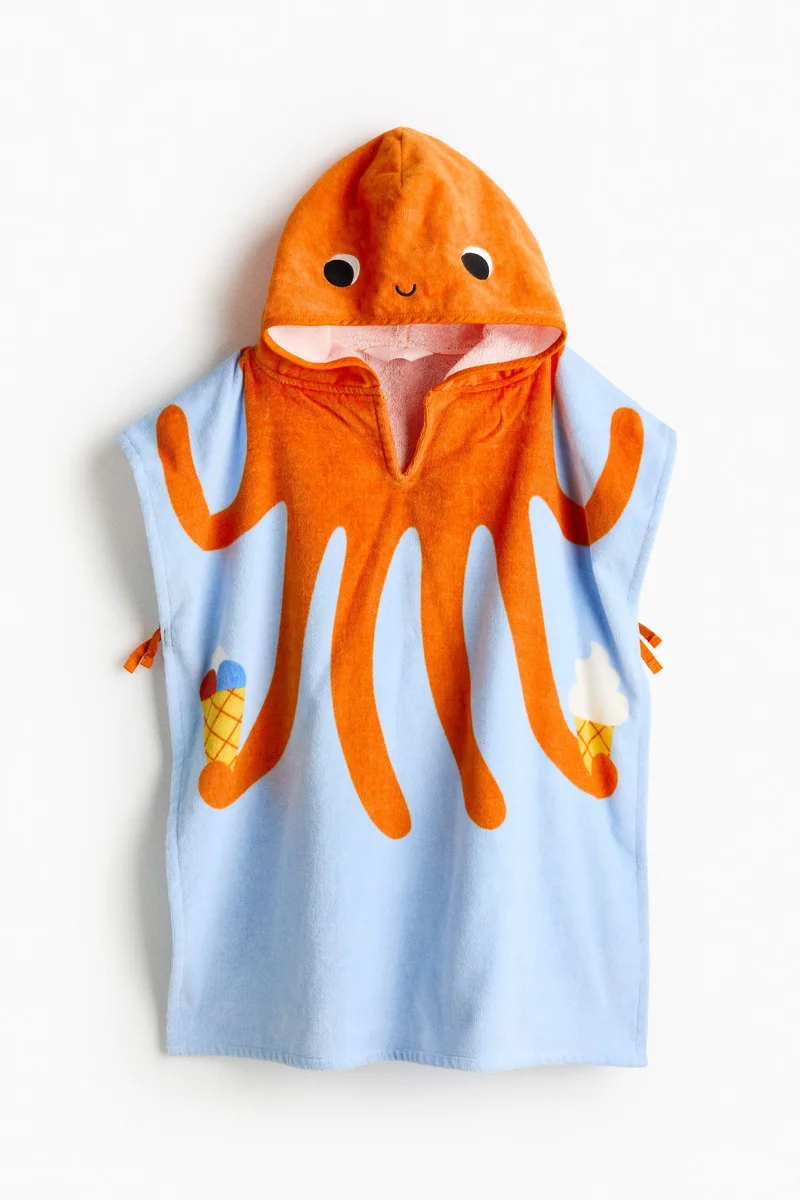 اتش اند ام منشفة بتصميم بونشو