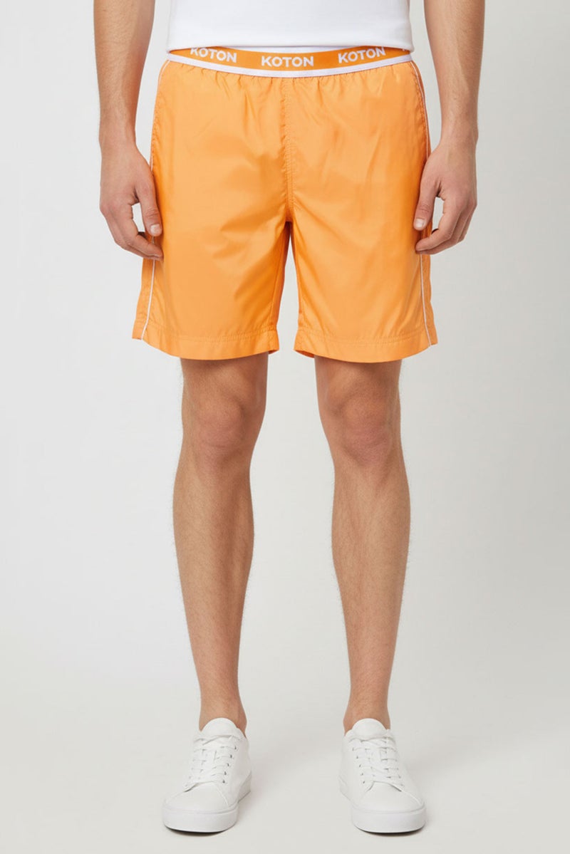 GIVENCHY Men Drawstring Brand Logo Basic Shorts, Orange - Image 1