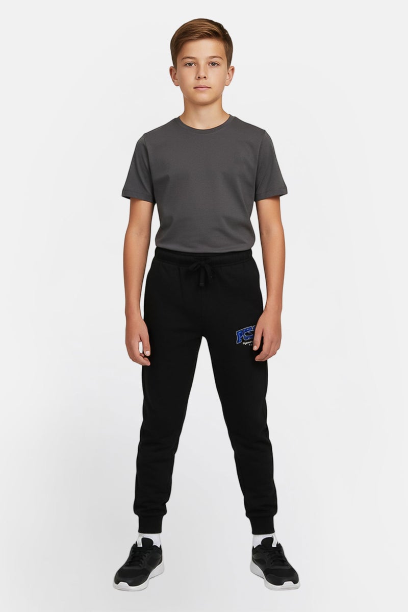 PUMA سروال رياضي خارجي للأطفال الأولاد بشعار العلامة التجارية، أسود - Image 1