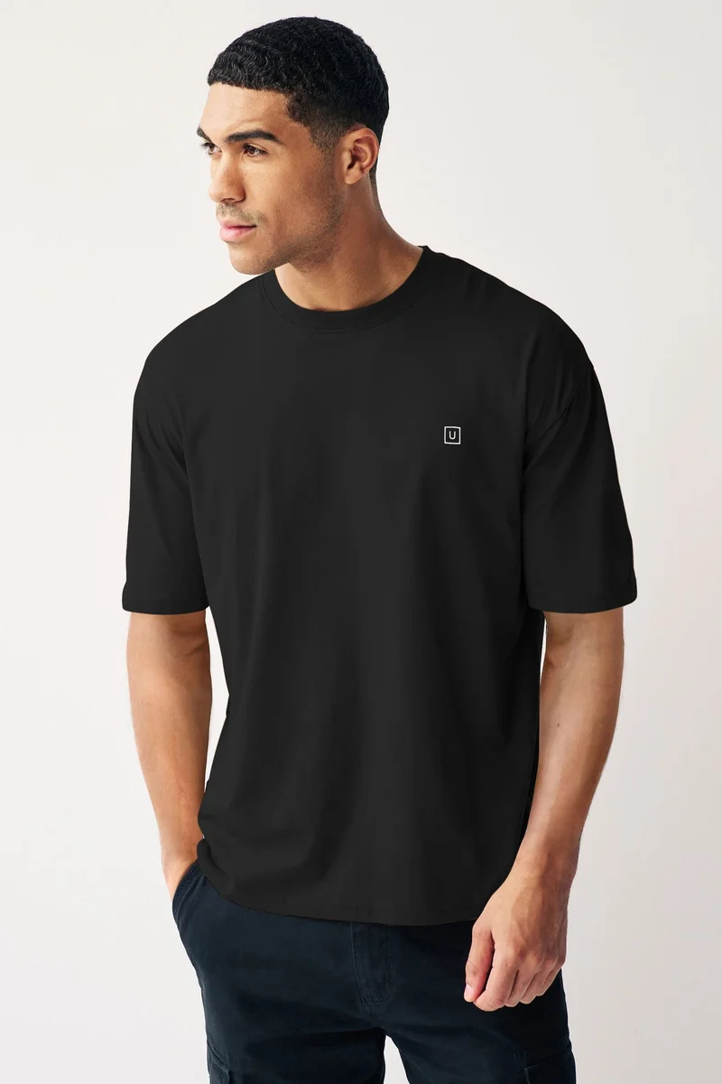 Urbano Fashion Men's Jet Black Solid Round Neck Oversized Half Sleeve Cotton T-Shirt