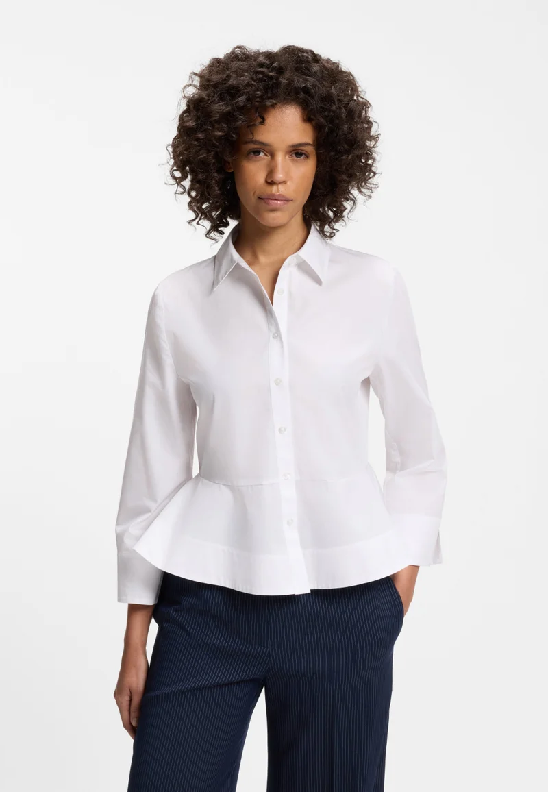 Slim-fit blouse in cotton with peplum hem